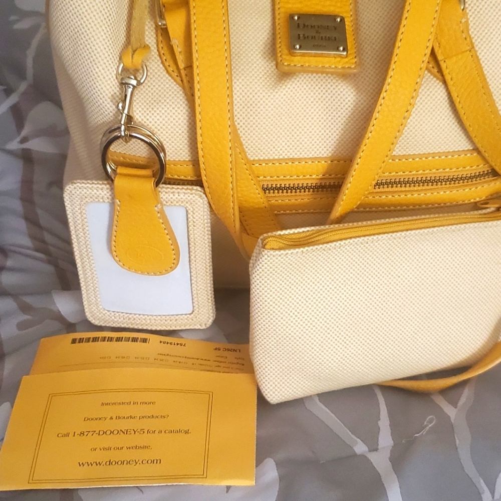 Original Authentic Dooney& Bourke bag with registration number papers
